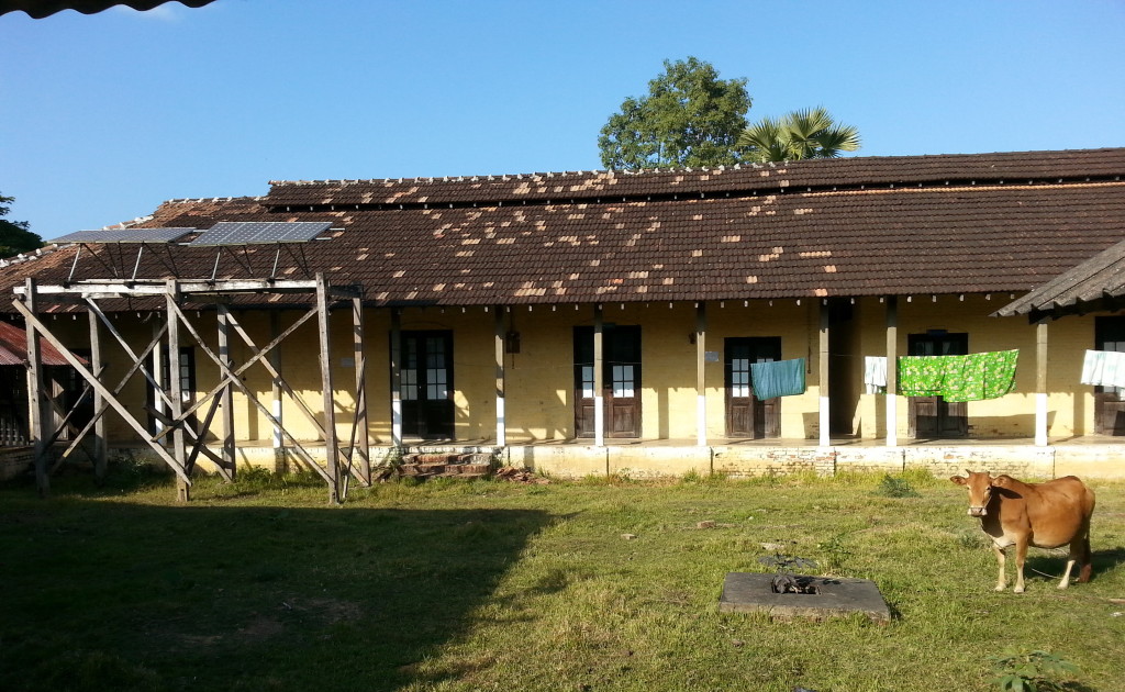 British hospital no longer in use except for solar panel, laundry and grazing.