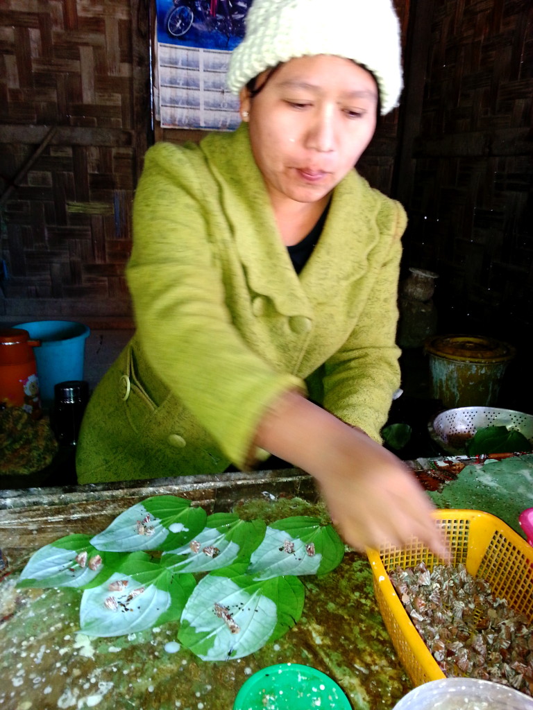 A popular red 'chew' rolled in leaves, is lime paste, tobacco and betel nut. 