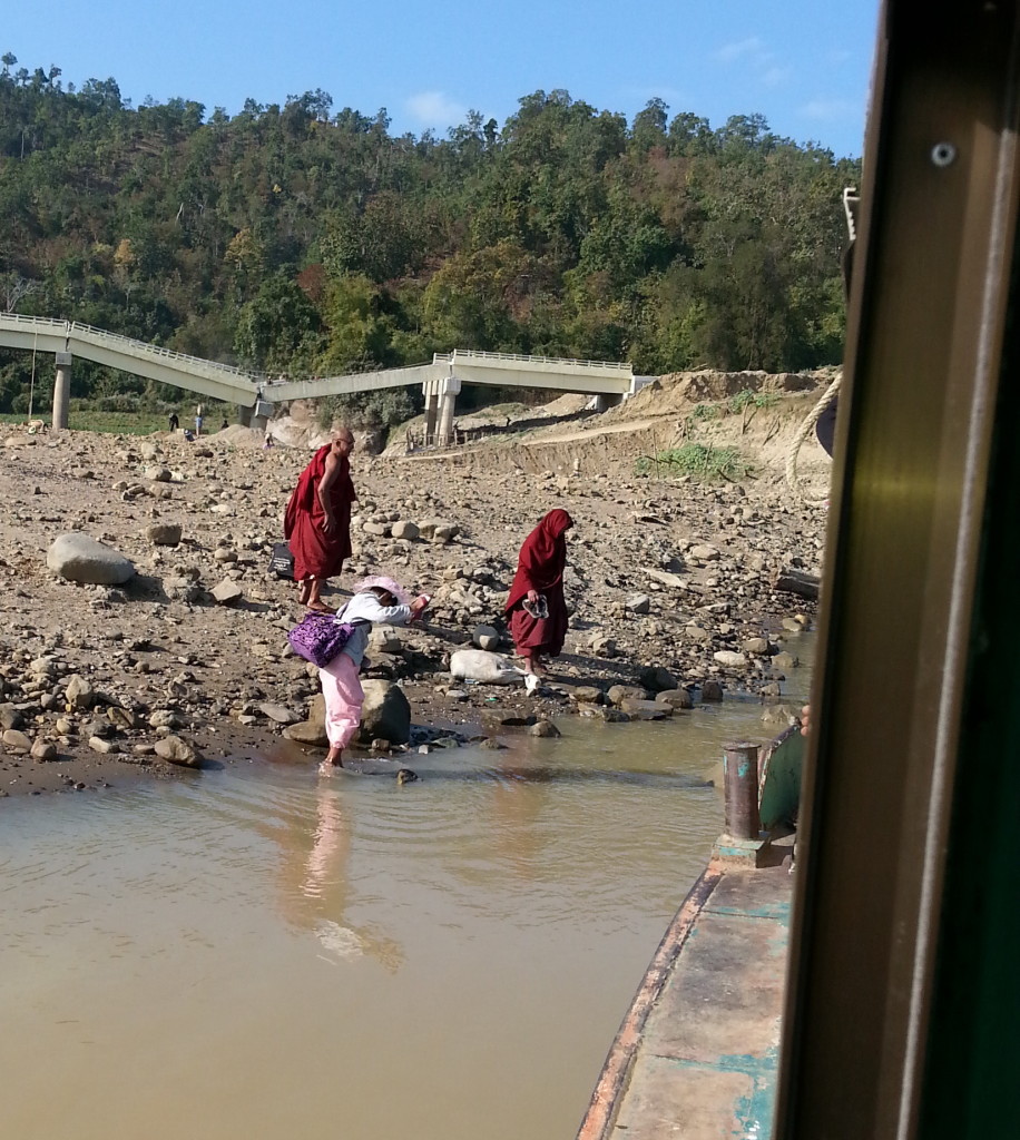 Bridge in background collapsed from monsoon floods and earthquakes.