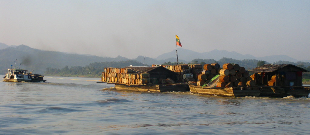 Oil barrels transported to logging camps.
